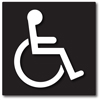 Accessible wheelchair symbol on a black background.